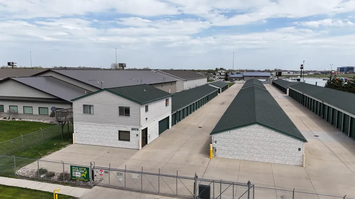 Aerial view of facility with drive up units